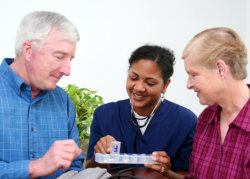 elderly couple and nurse